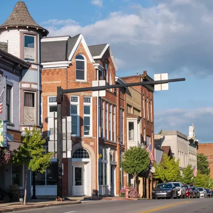 View of downtown Ashland, Ohio with historic storefronts, showcasing the area’s vibrant community and residential real estate opportunities.